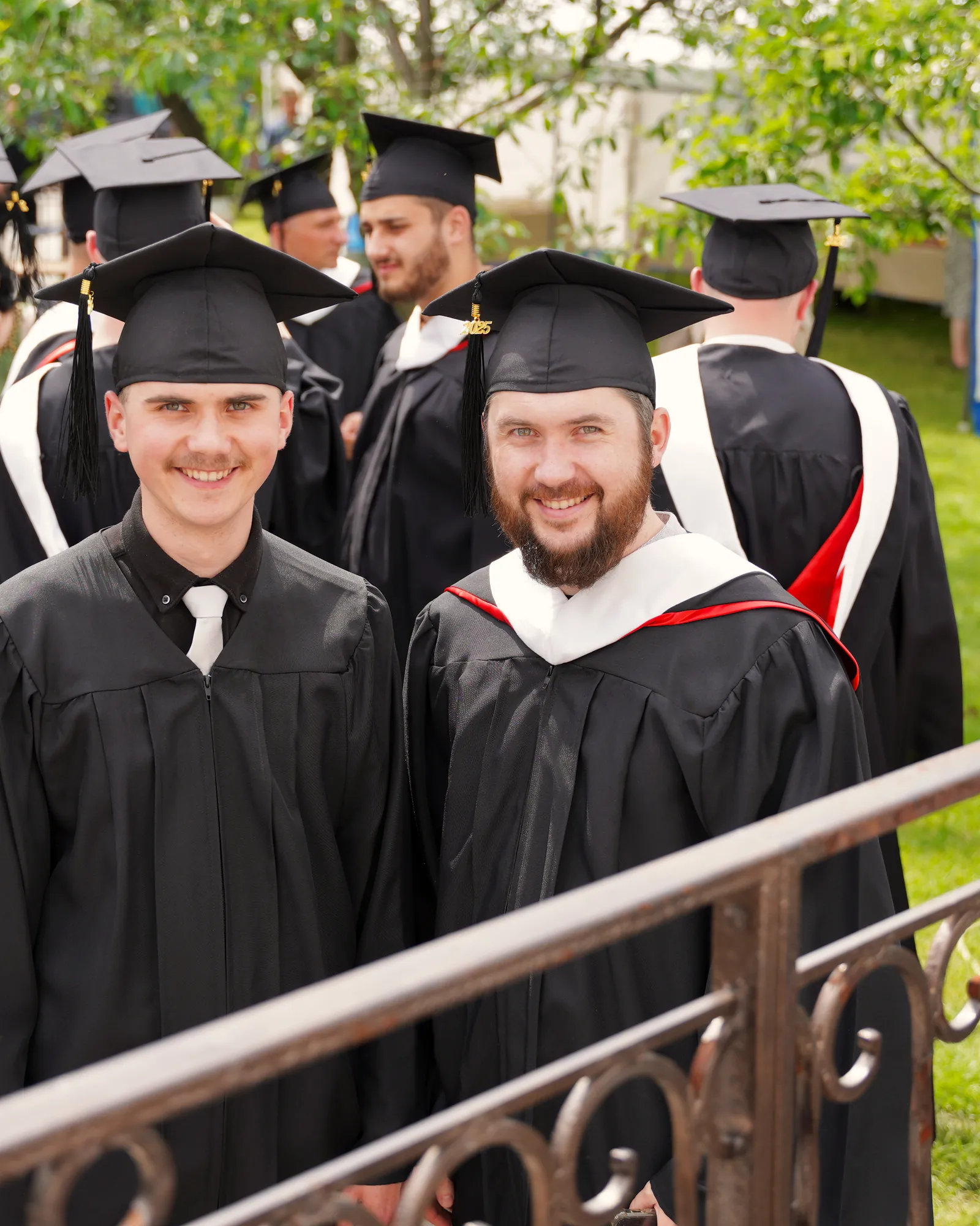 Smiling seminary graduates